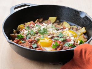 Skillet Potatoes With Eggs and Spiced Tomato Sauce Meatless Monday
