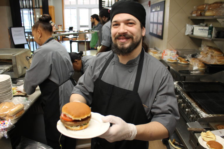 a hendrix chef shows off the gardein burger