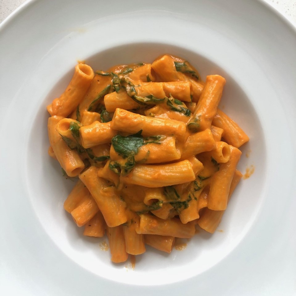 Pasta with a Creamy Red Bell Pepper Sauce and Wilted Mizuna